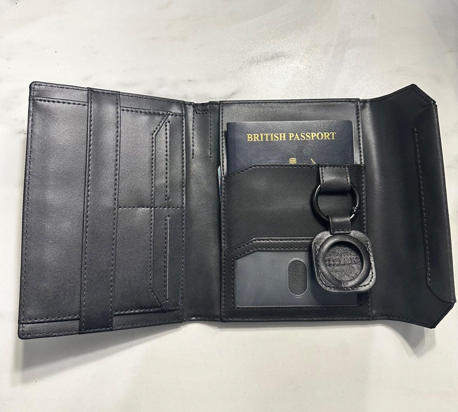VULKIT VPW104 porta passaporto nero RFID con AirTag