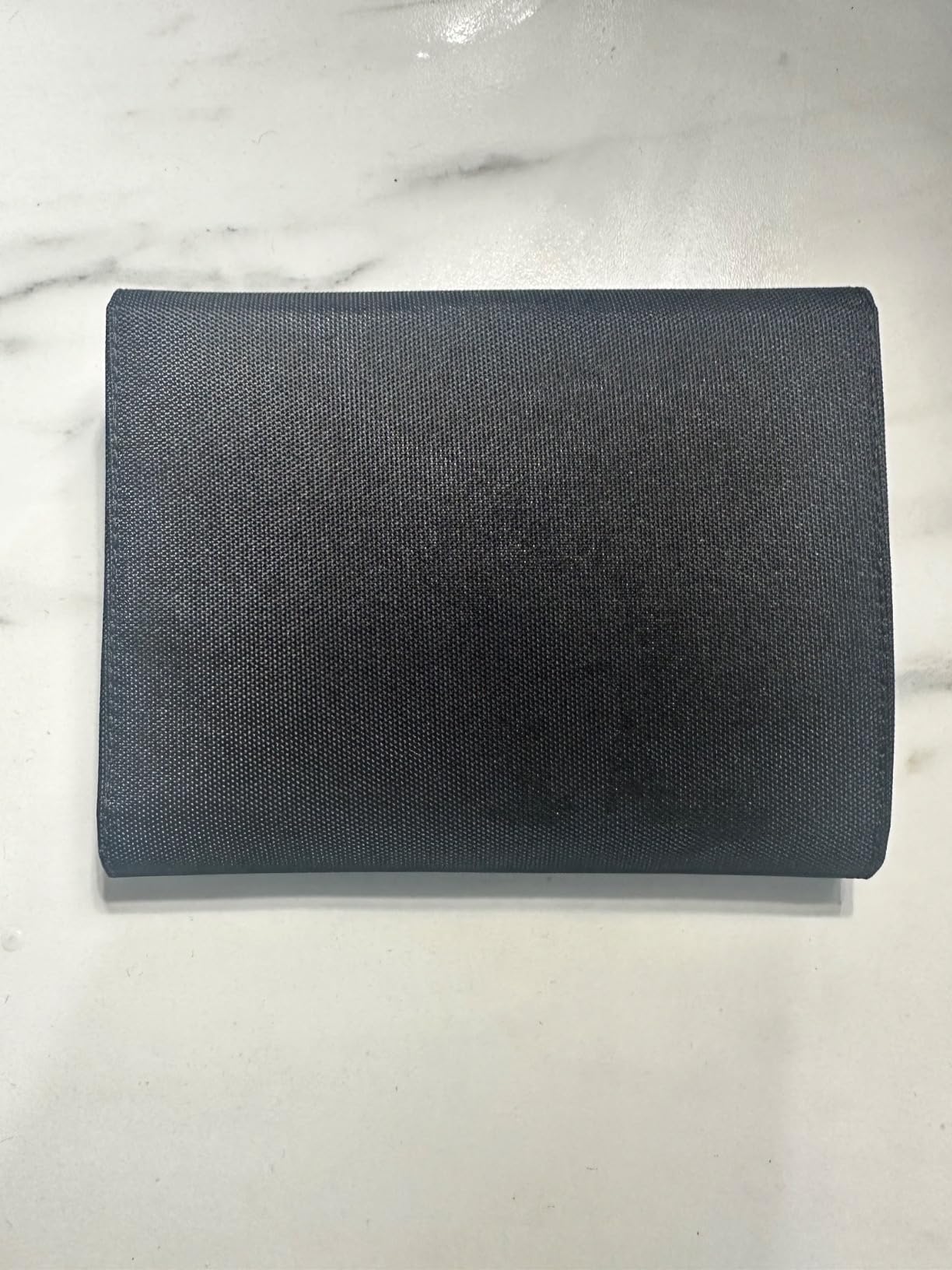 VULKIT VPW104 porta passaporto nero RFID con AirTag